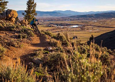 A mountain biker as sun goes down at Hartman Rocks Recreation Area