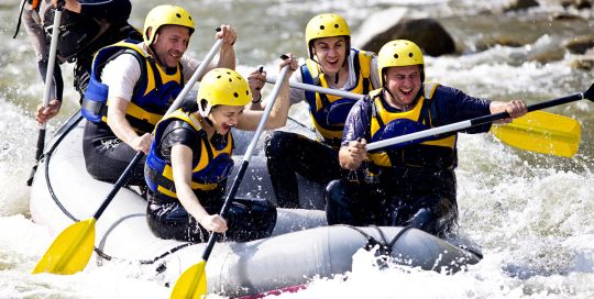 Group of rafters on whitewater